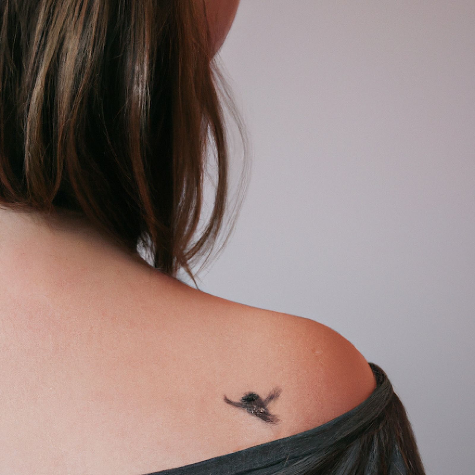 Bird tattoo on shoulder for women