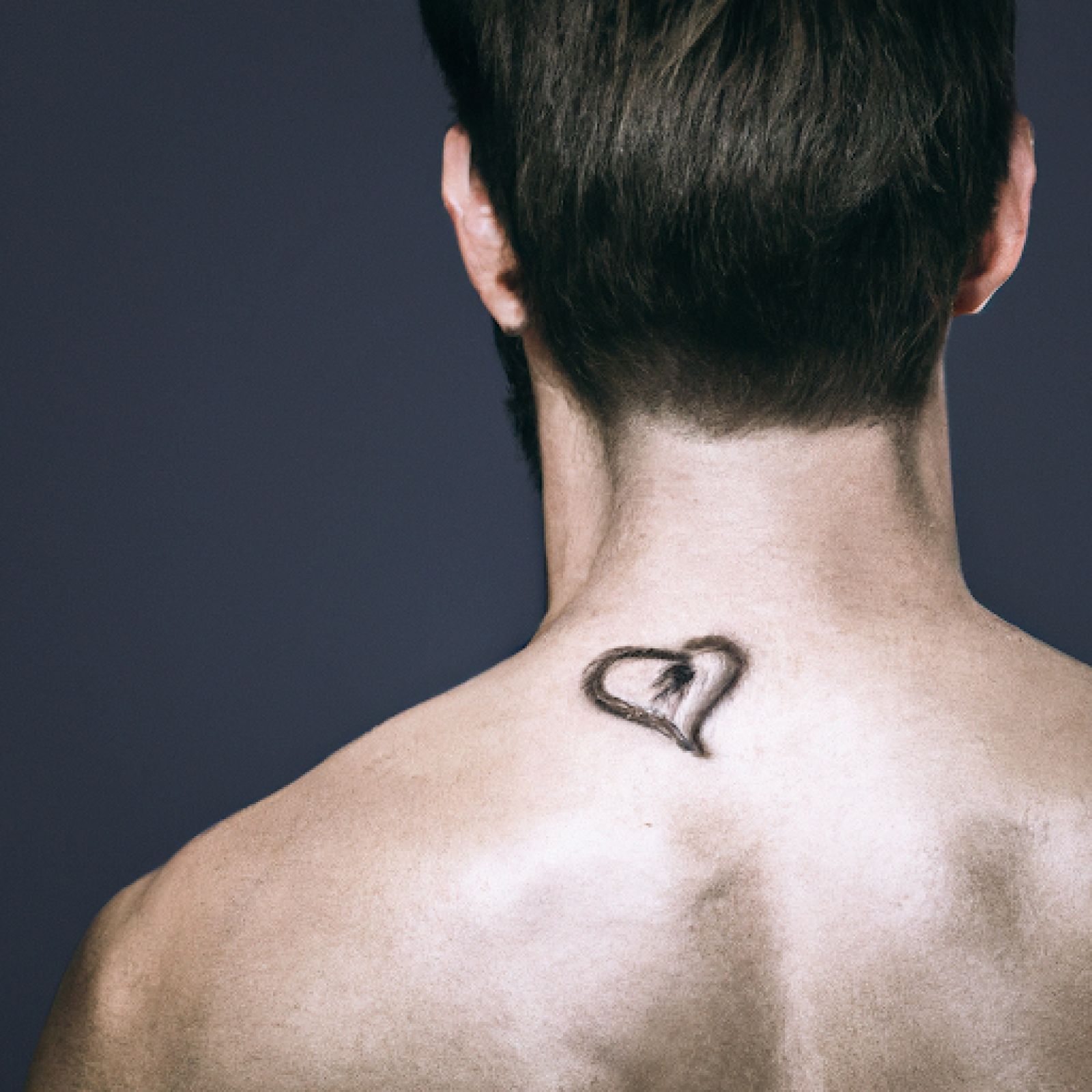 Broken heart tattoo on shoulder for men
