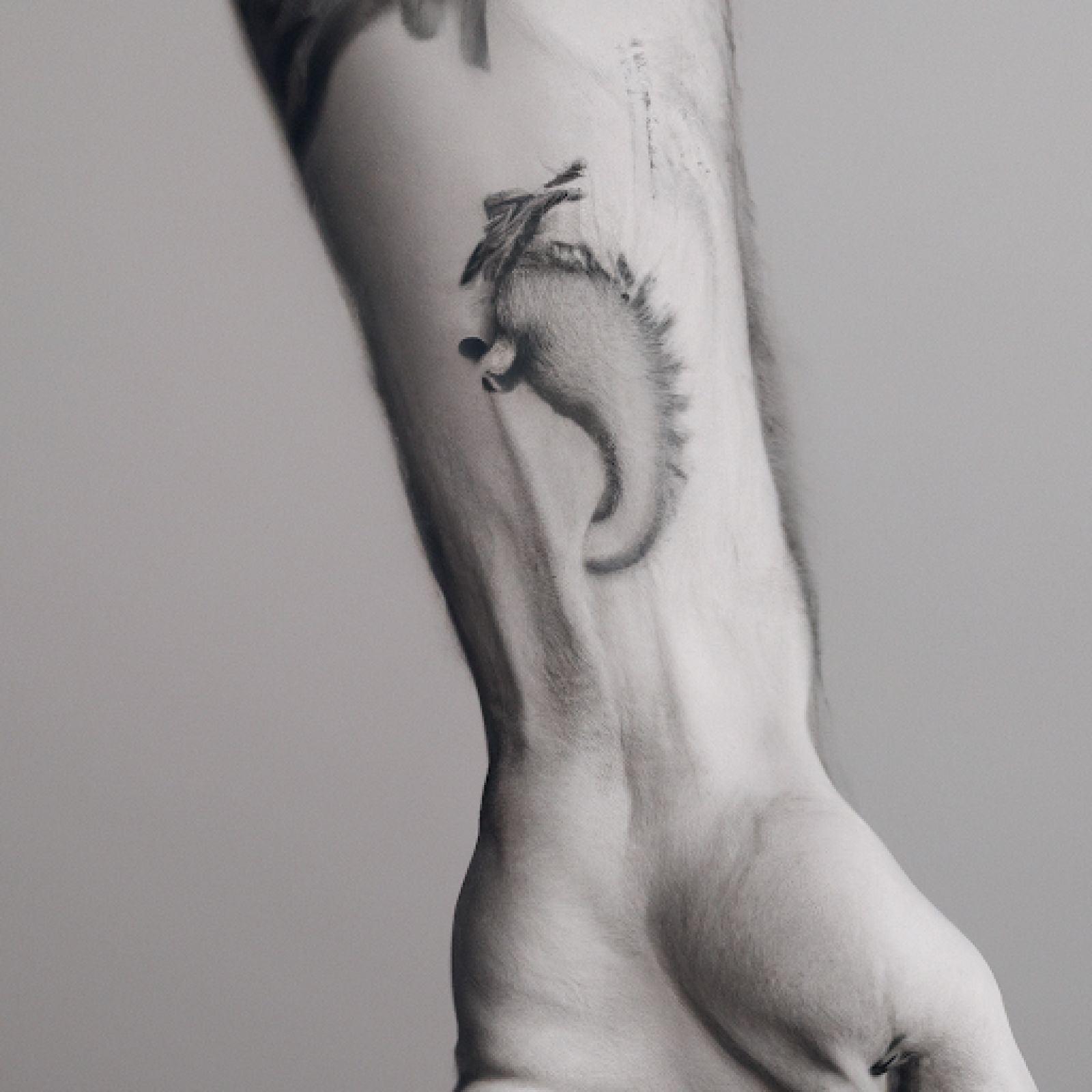 Dragon tattoo on wrist for men