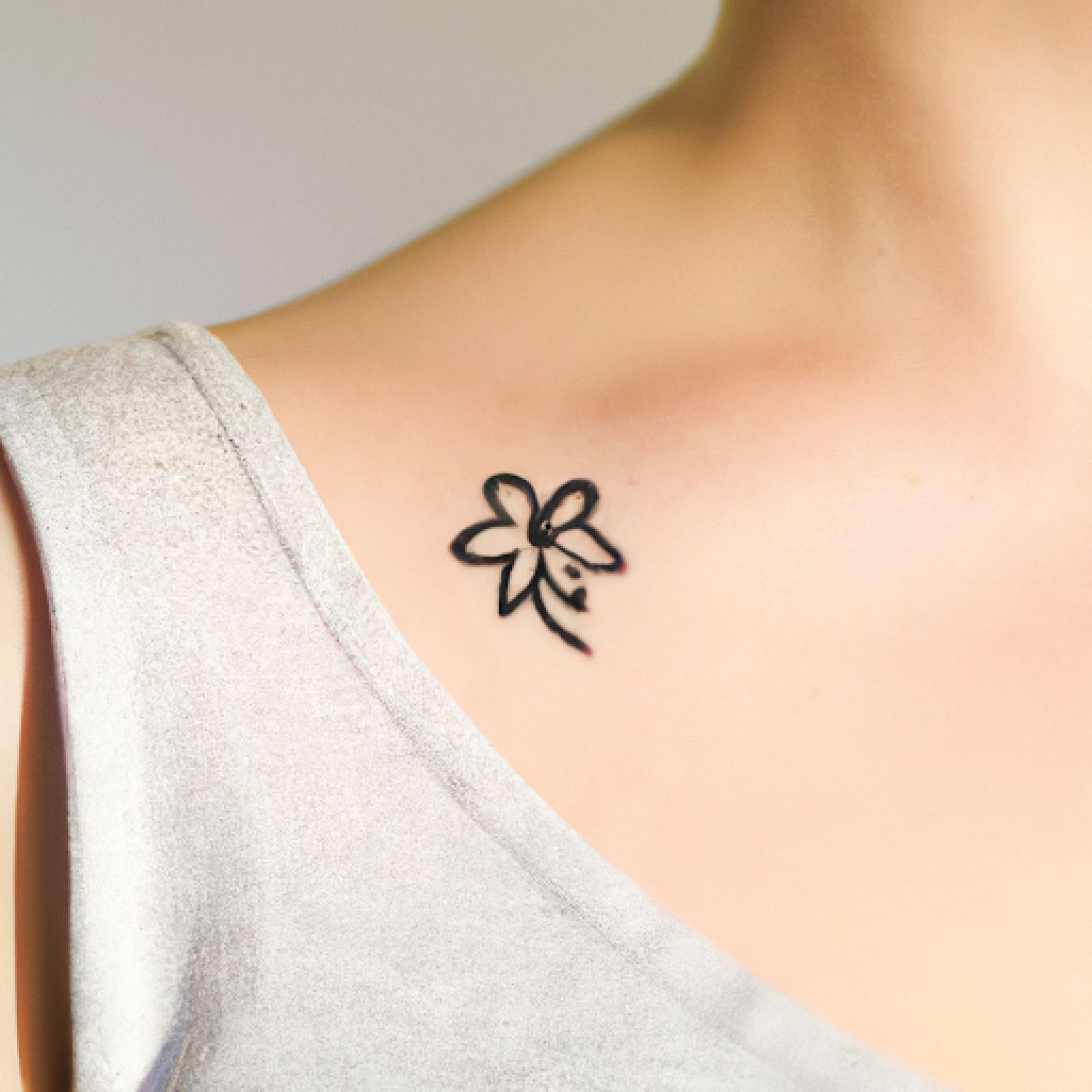 Flower tattoo on chest for women