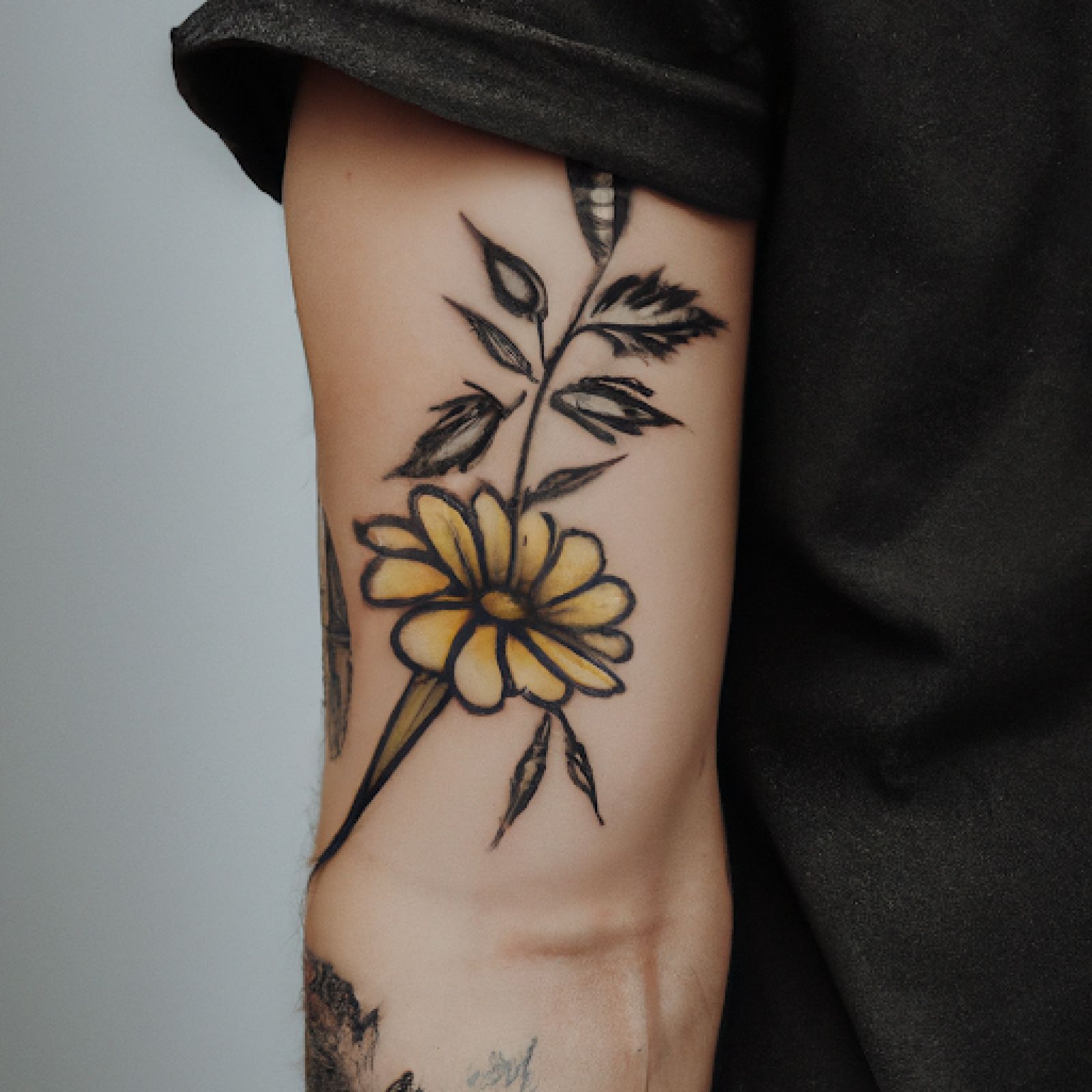 Flower tattoo on sleeve for men