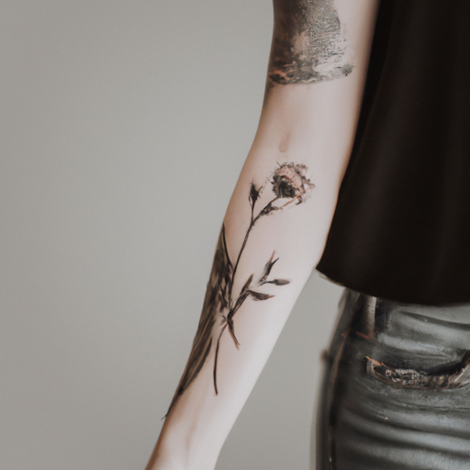 Flower tattoo on sleeve for women