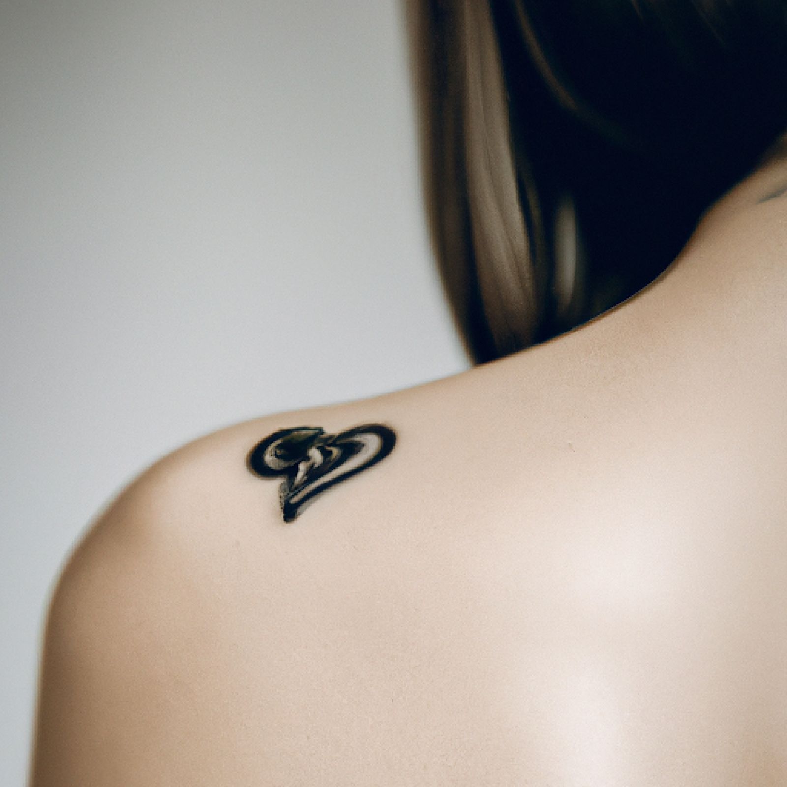 Heart tattoo on shoulder for women