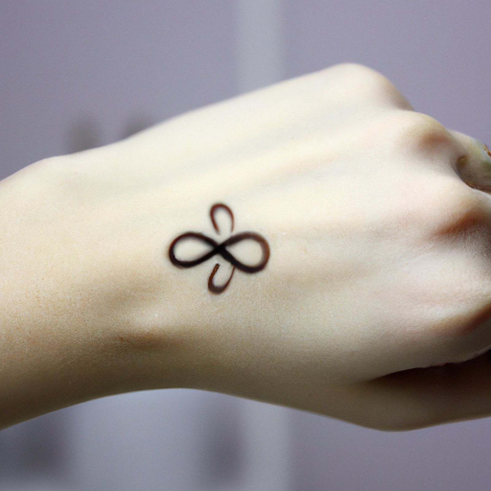 Infinity tattoo on wrist for women