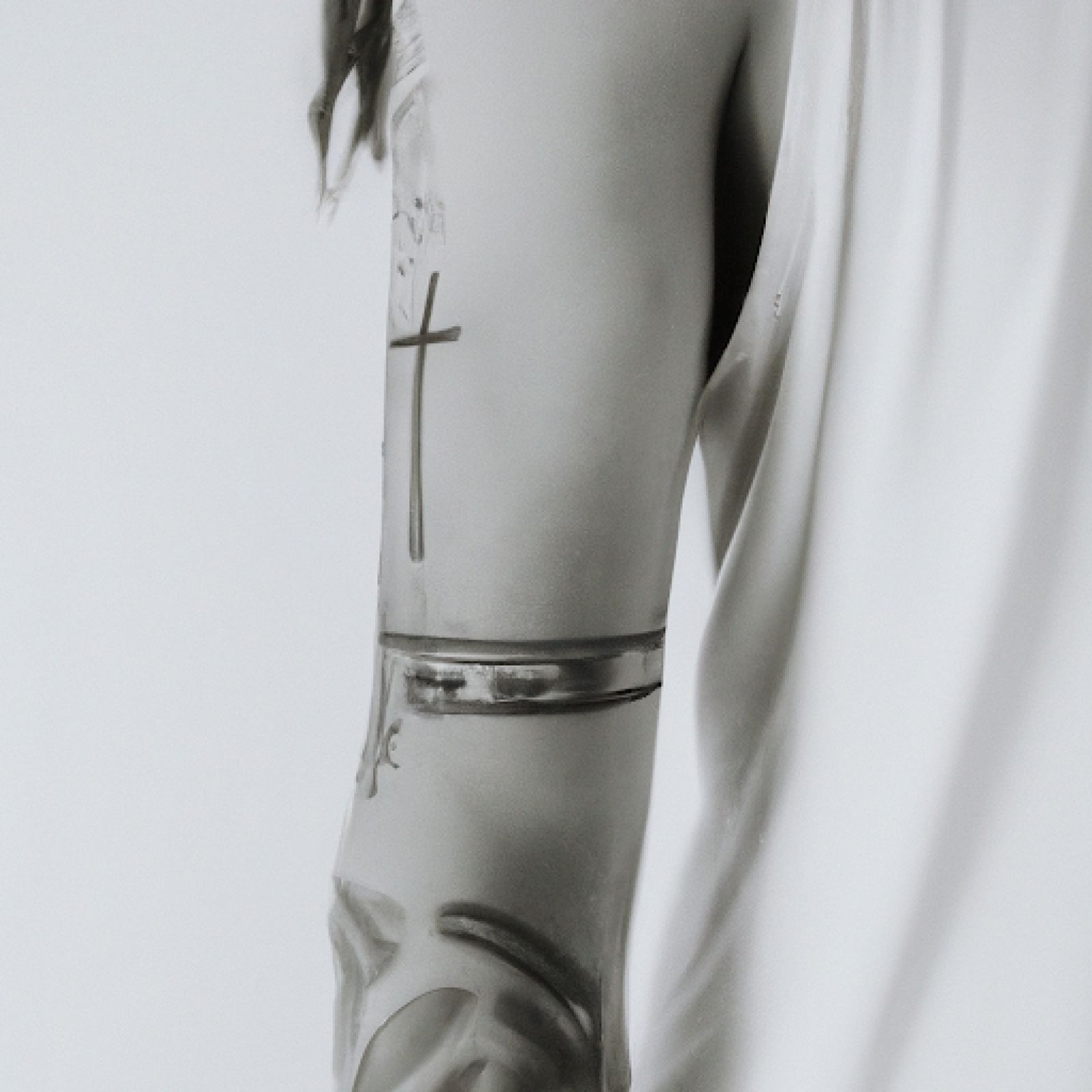 Jesus tattoo on arm for women