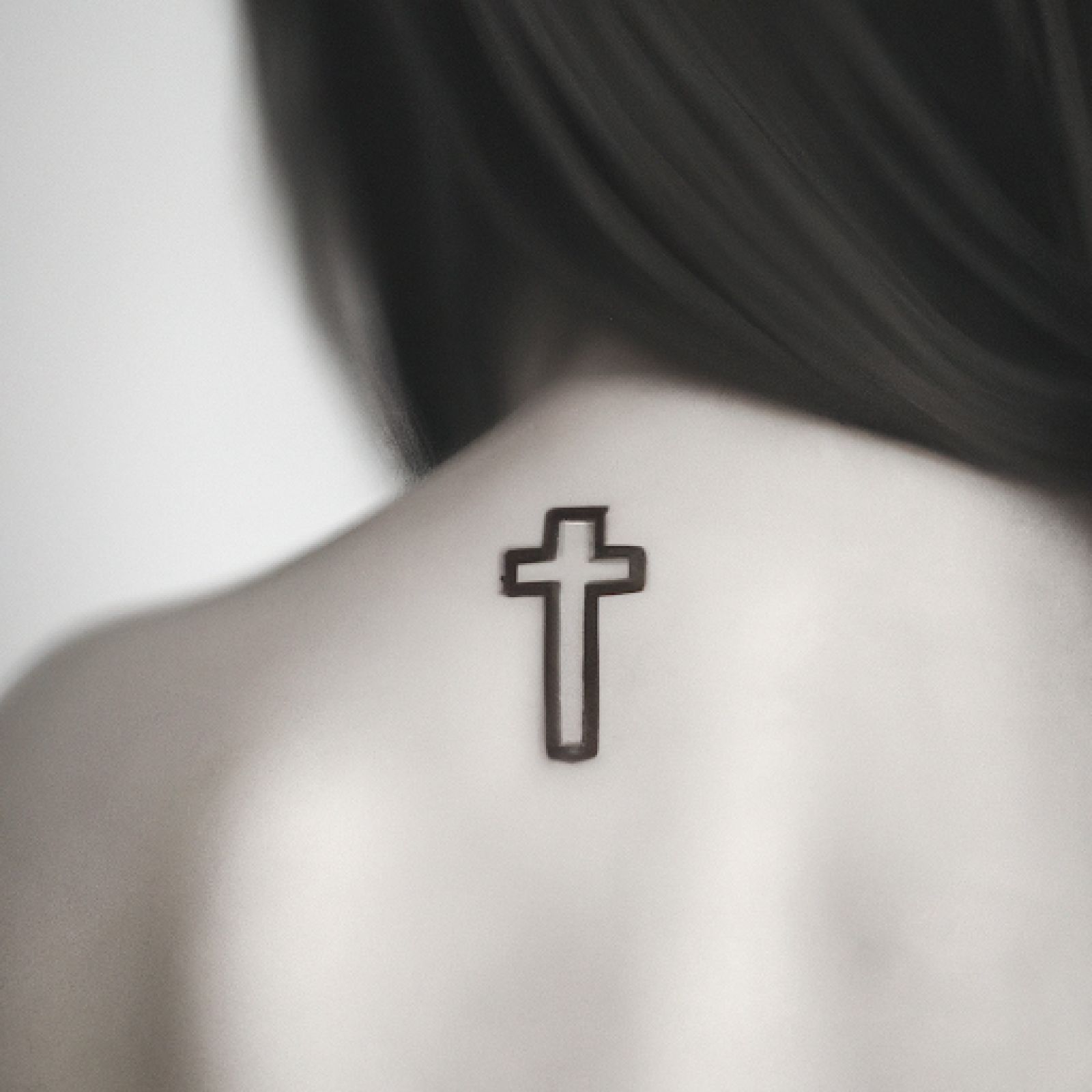 Jesus tattoo on shoulder for women