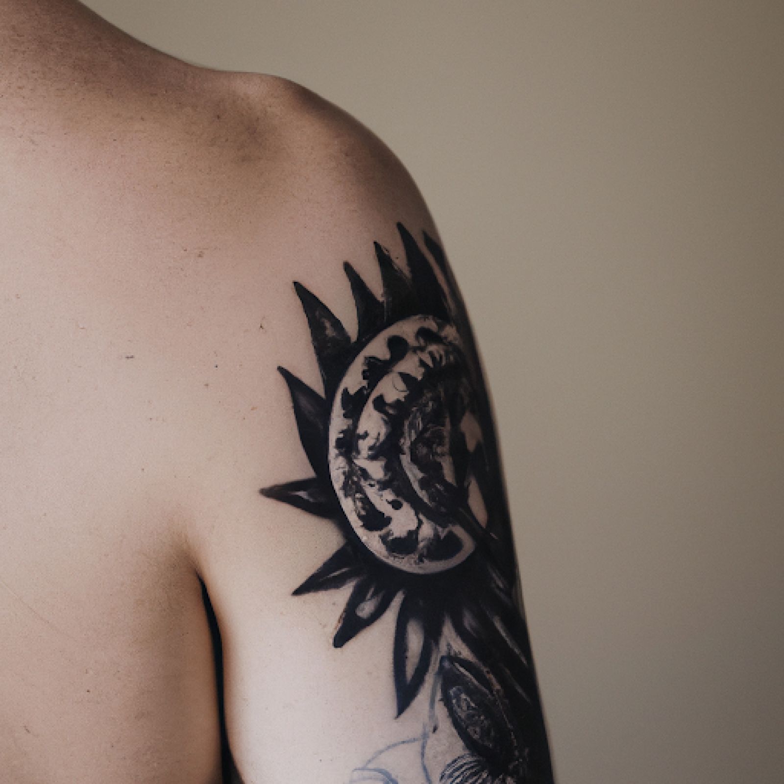 Mandala tattoo on shoulder for men
