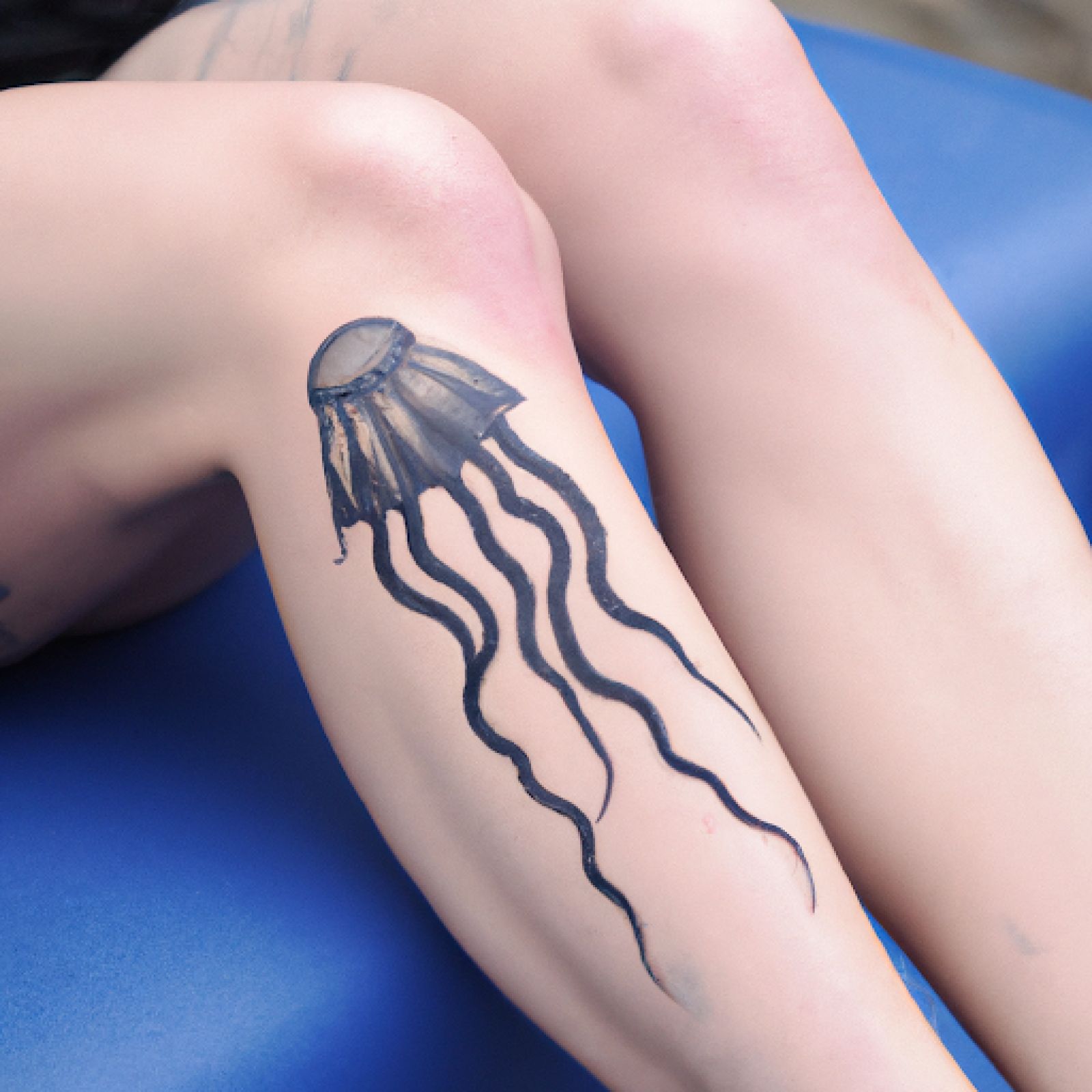Medusa tattoo on knee for women