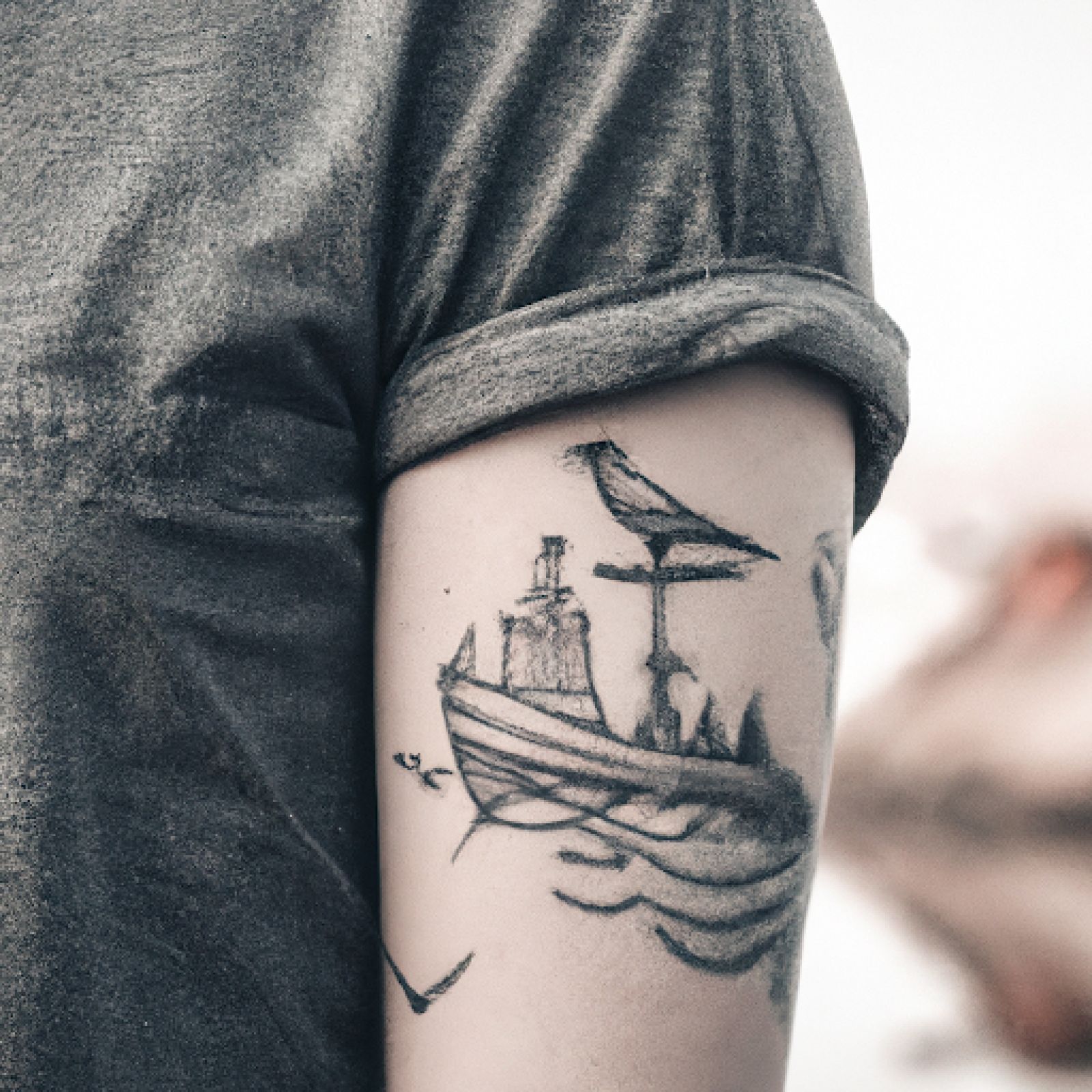 Ship tattoo on chest for men