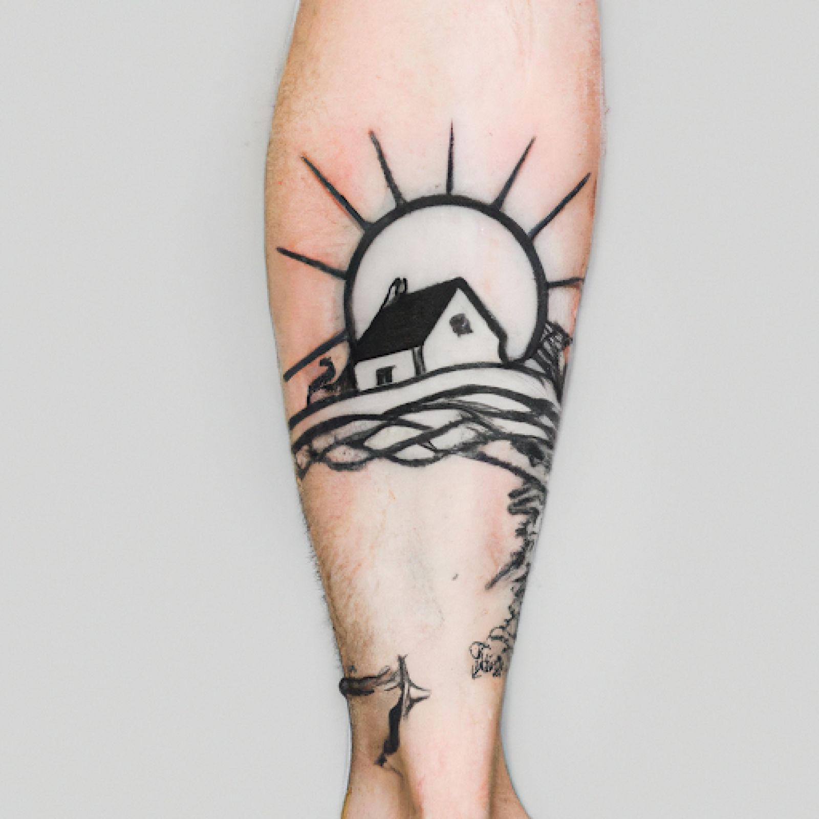Watercolor tattoo on calf for men