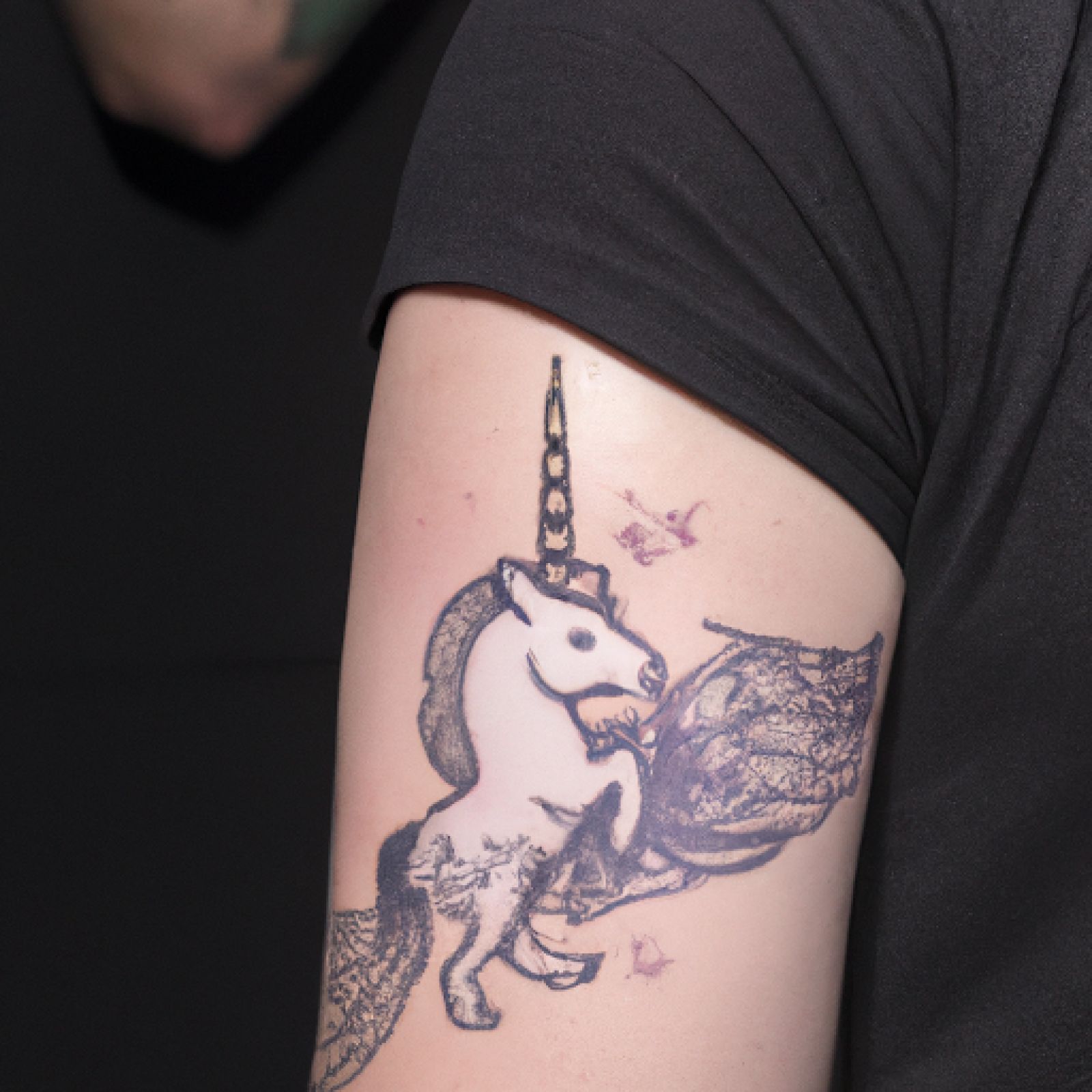 Unicorn tattoo on half sleeve for men