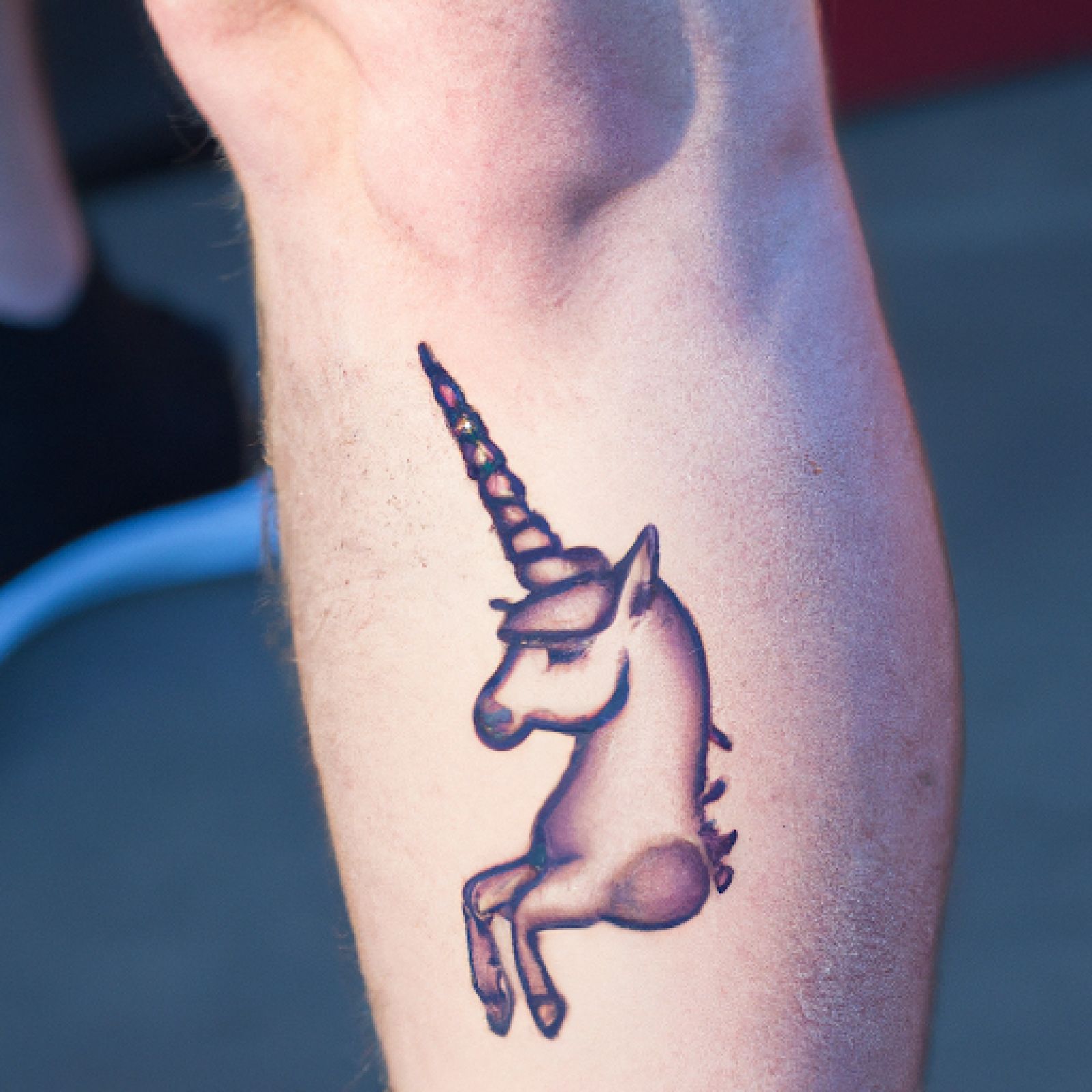 Unicorn tattoo on knee for men