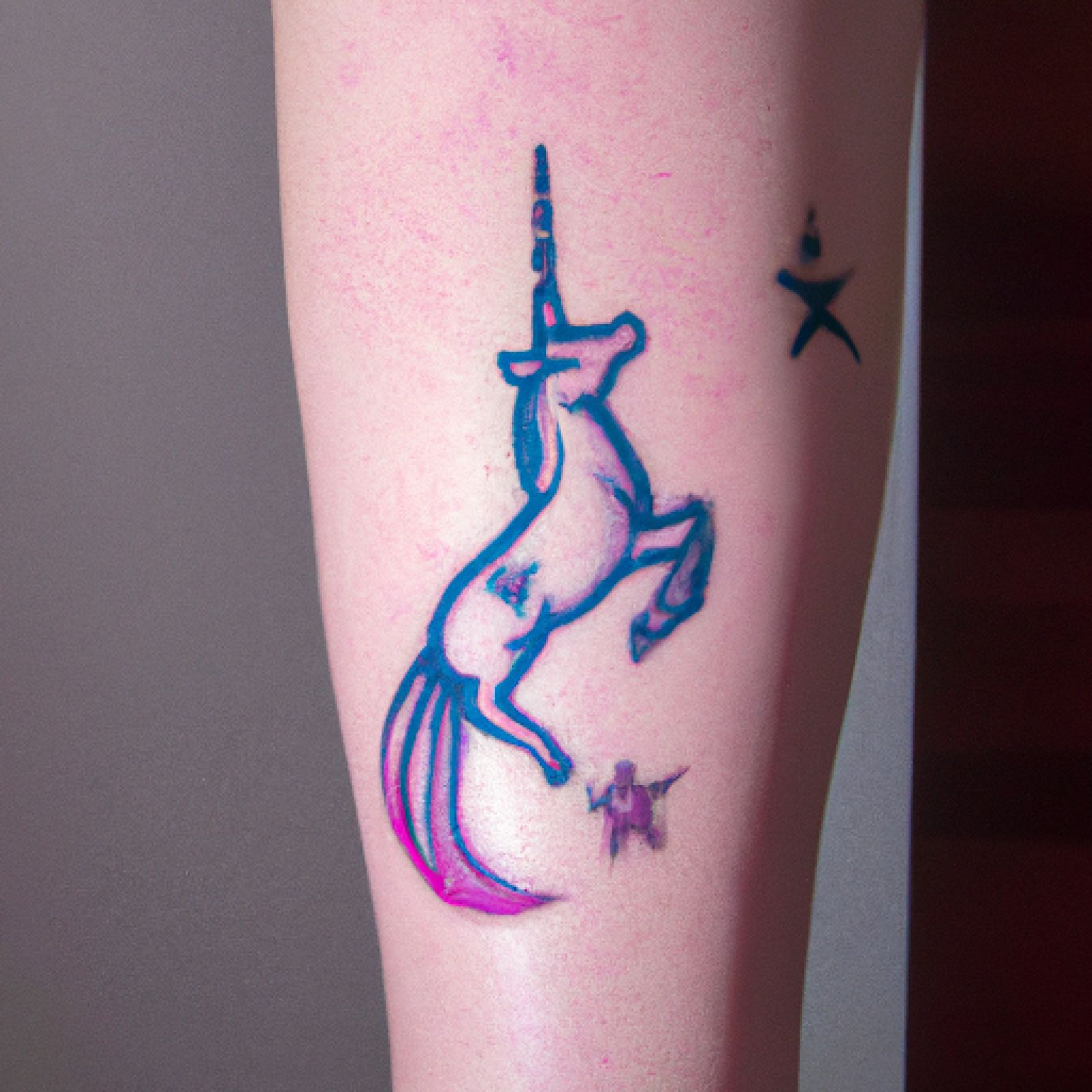 Unicorn tattoo on leg for women