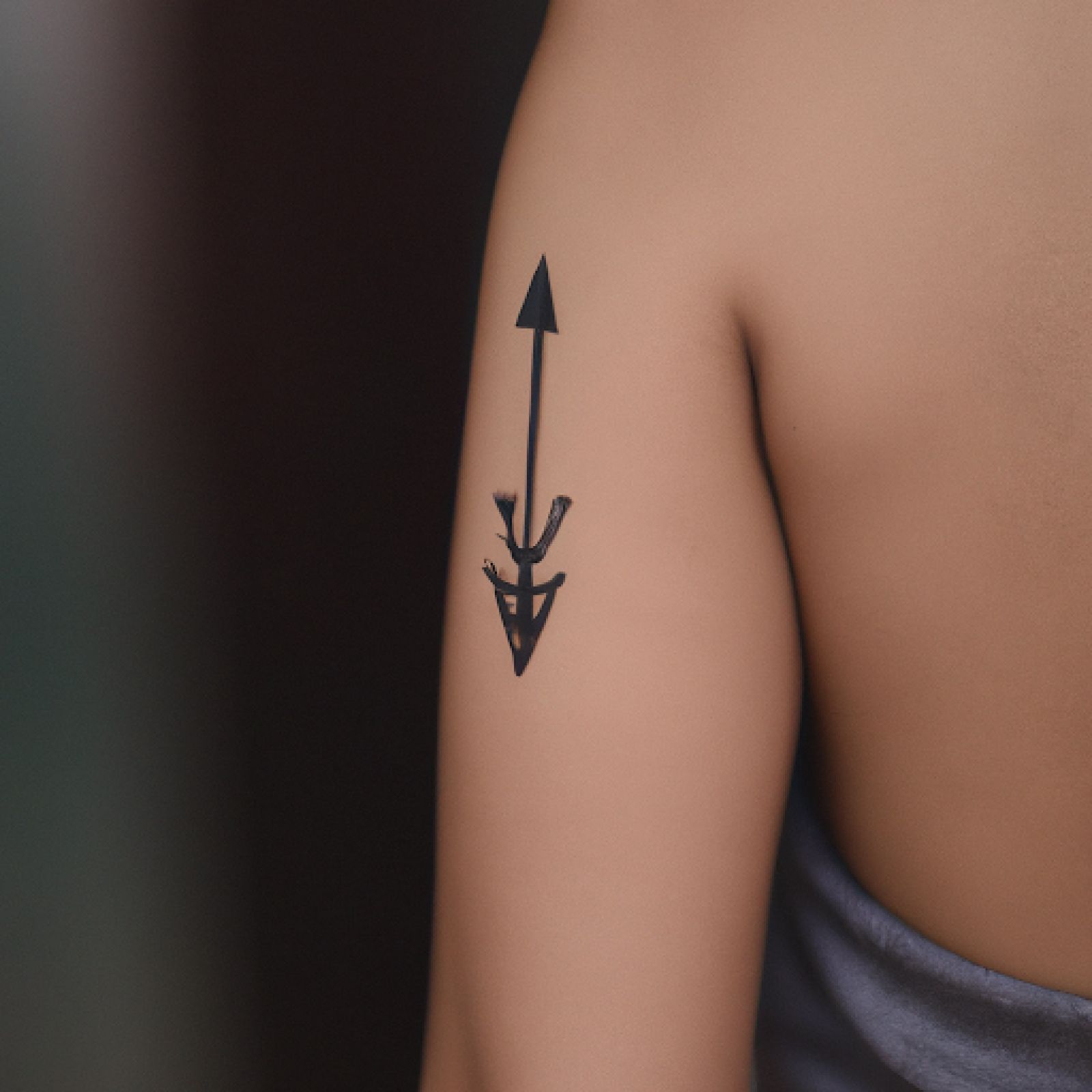 Arrow tattoo on forearm for women