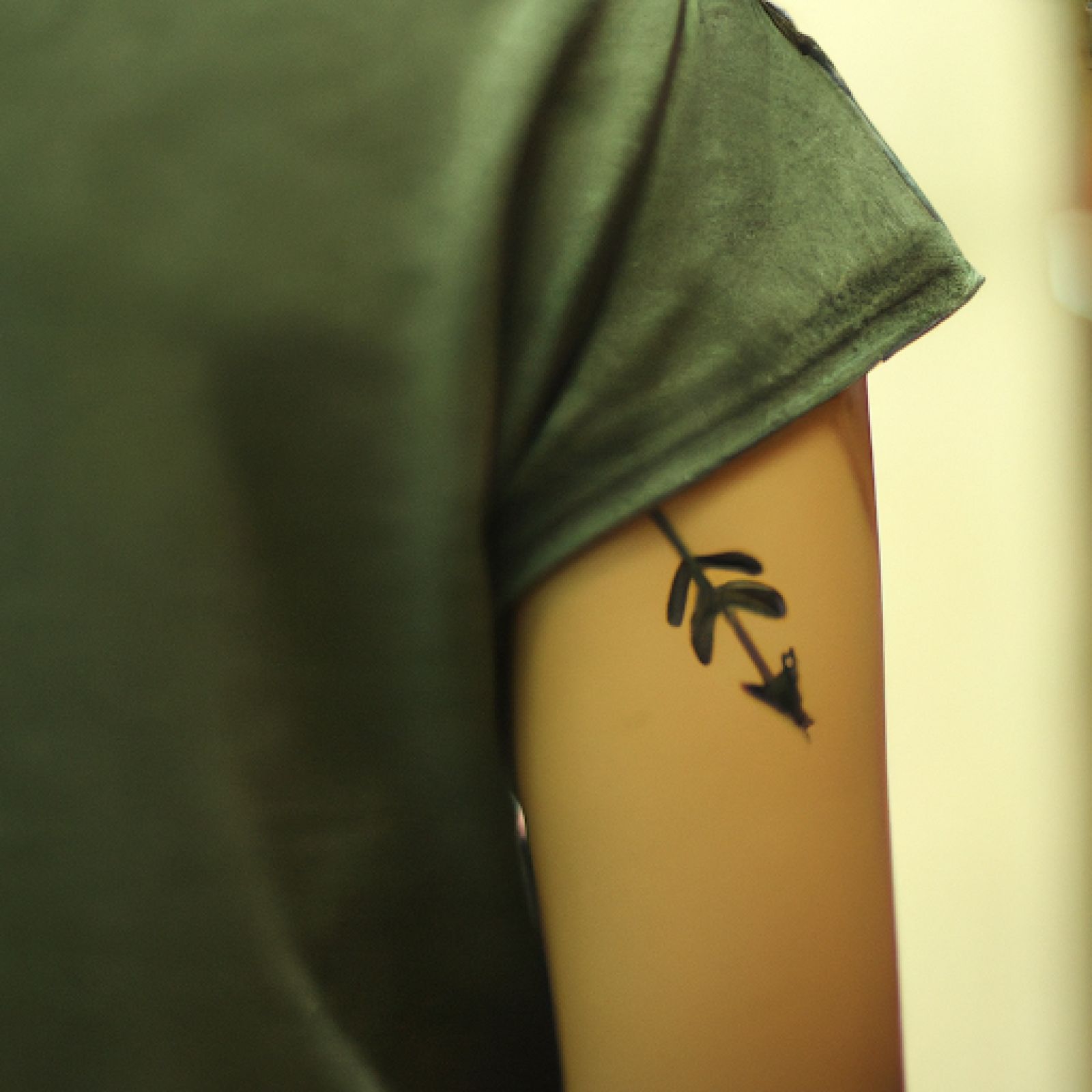 Arrow tattoo on half sleeve for women