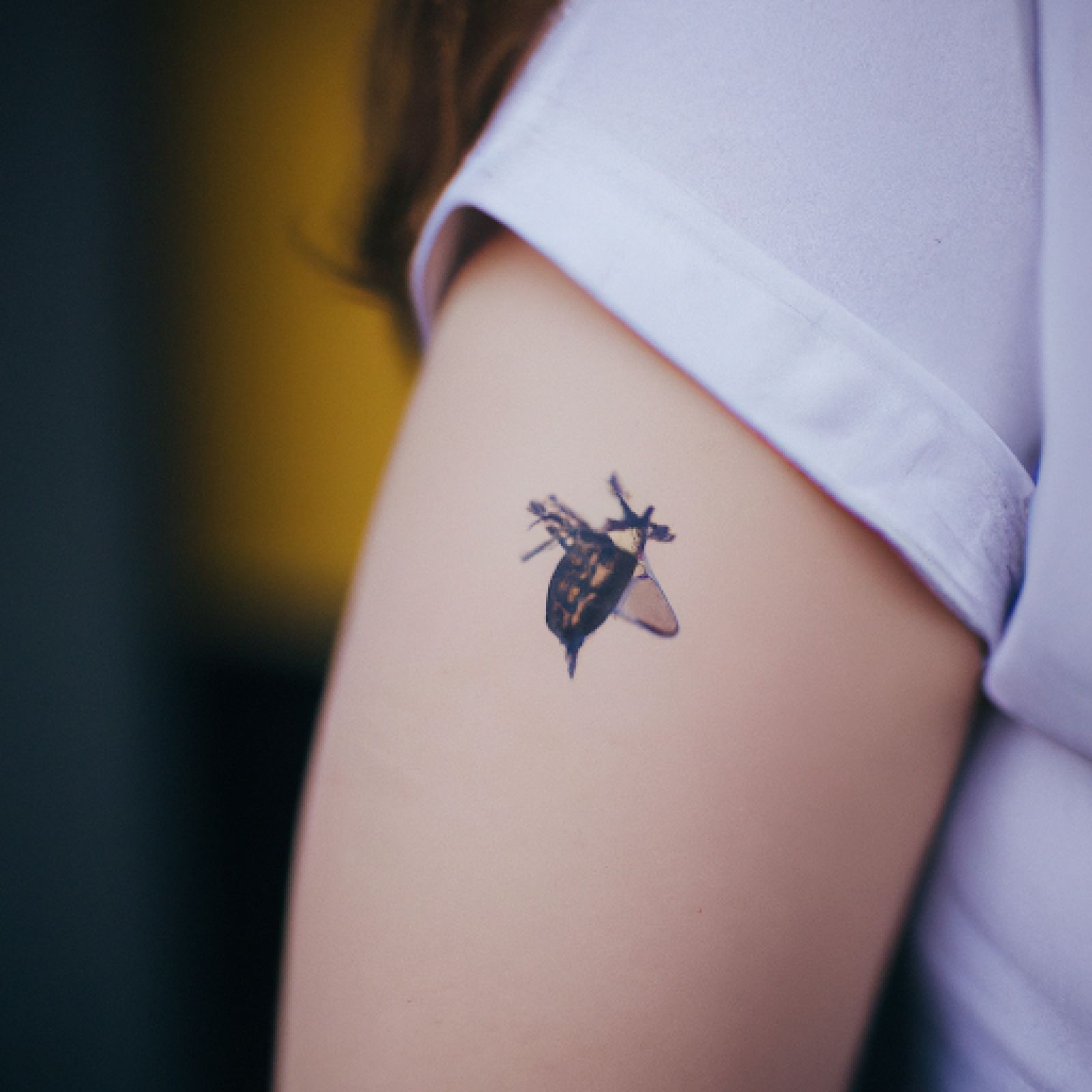 Bee tattoo on half sleeve for women