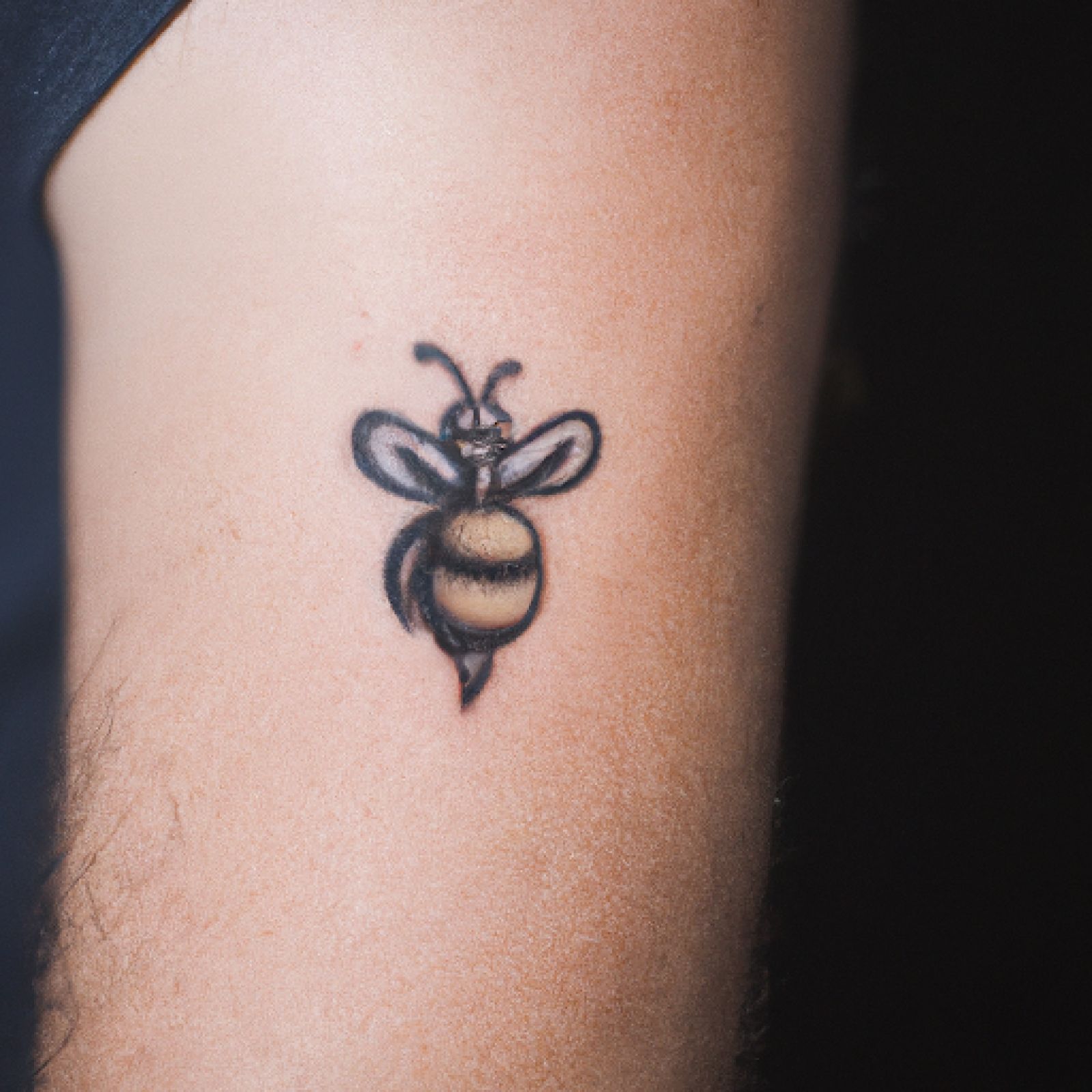 Bee tattoo on sleeve for men