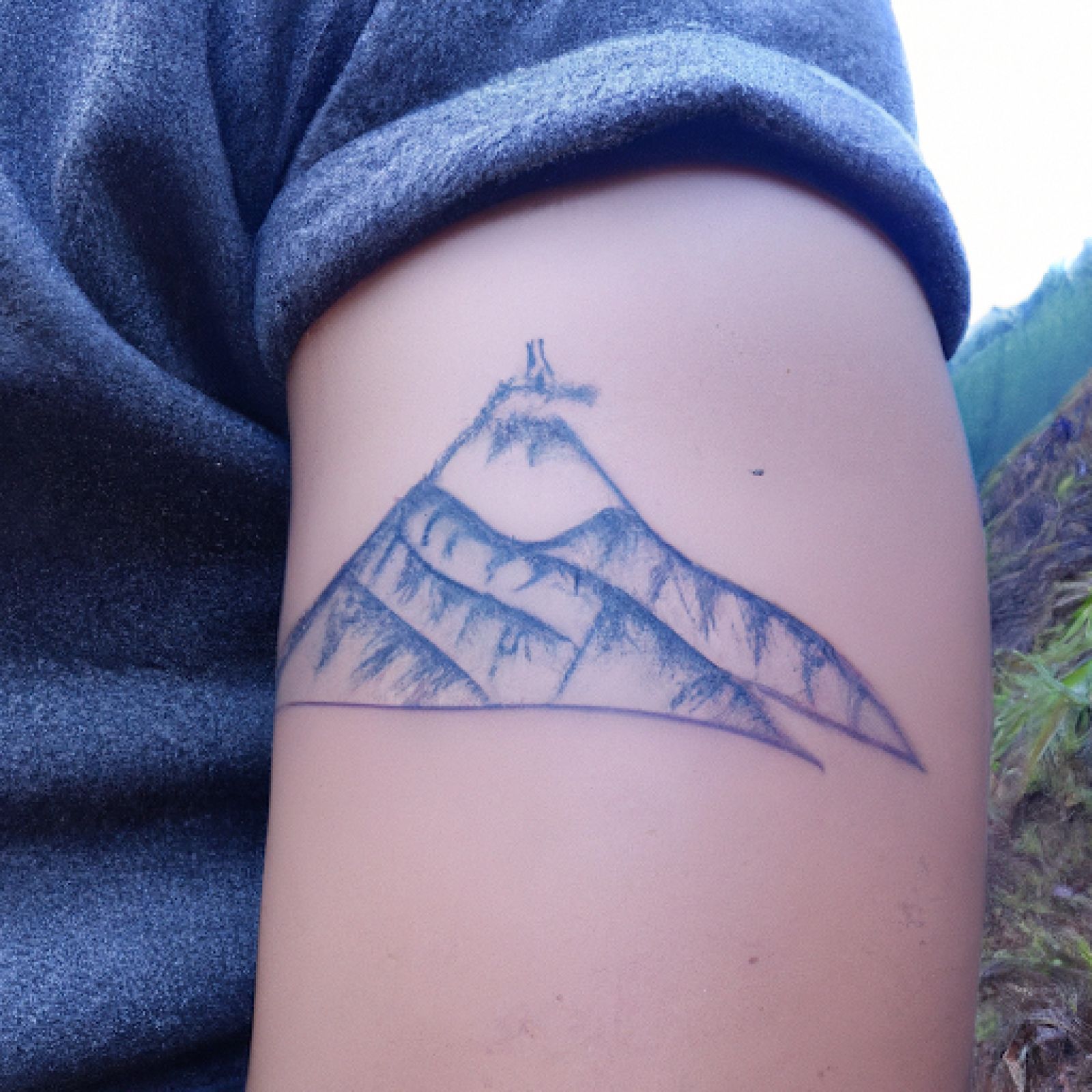 Mountain tattoo on sleeve for men